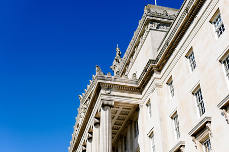 Photograph of Stormont from the side underneath a very blue sky.