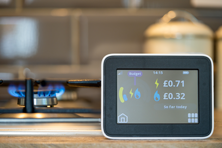 Image of a Smart Meter in front of a gas cooker.