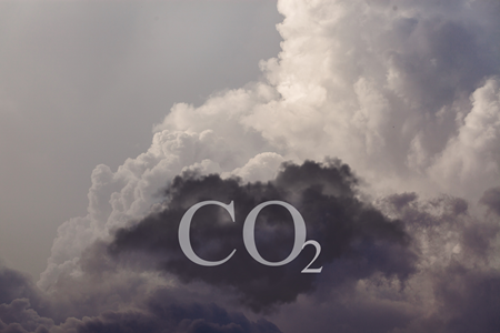 Black and white image of clouds with the letters CO2 superimposed on them.