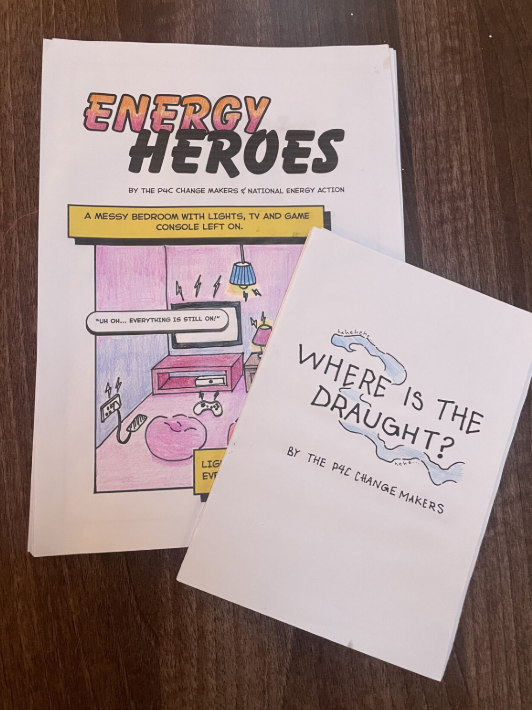 Two cartoon comic covers created by children taking part in National Energy Action's education programmes. One is called 'Energy Heroes' and the second is entitled 'Where's the draught?'